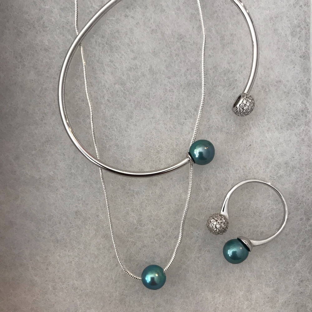 Sterling silver Cinderella blue pearl set.